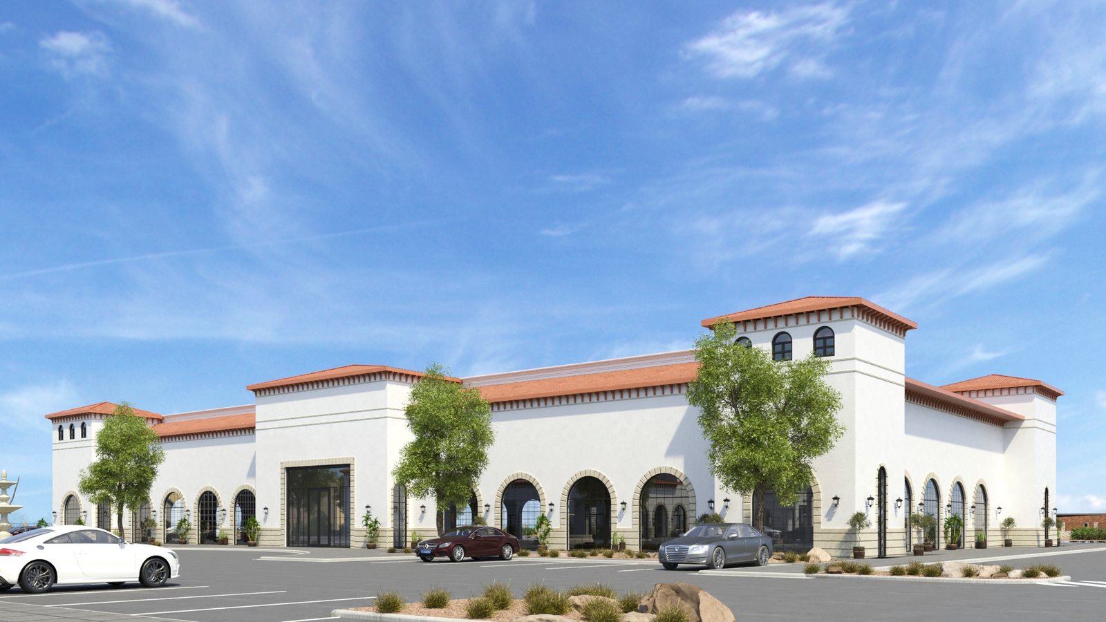 Single-story retail wing with fountain